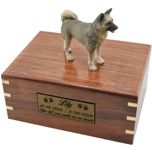 Gray akita dog figurine on wood cremation urn, engraved plate